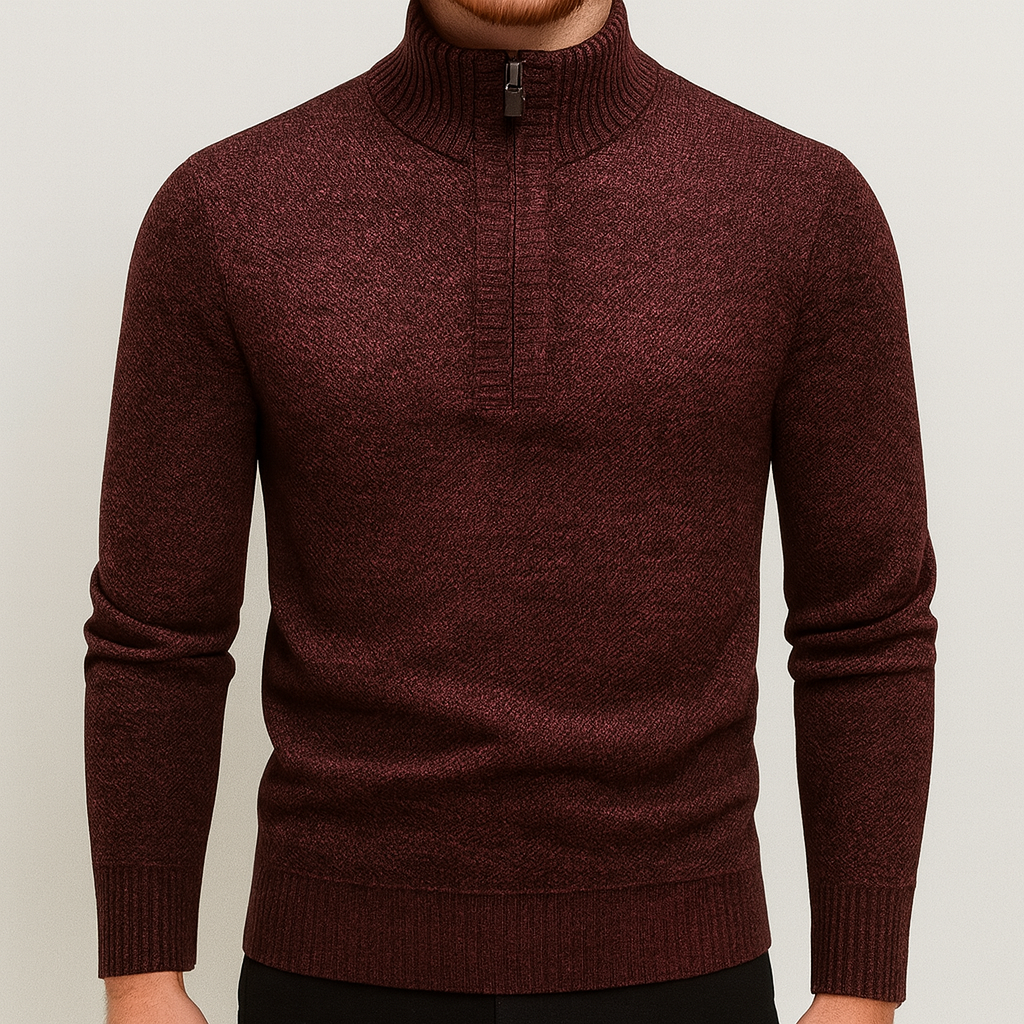 A knit pullover sweater with a half-zip mock neck and ribbed cuffs and hem.