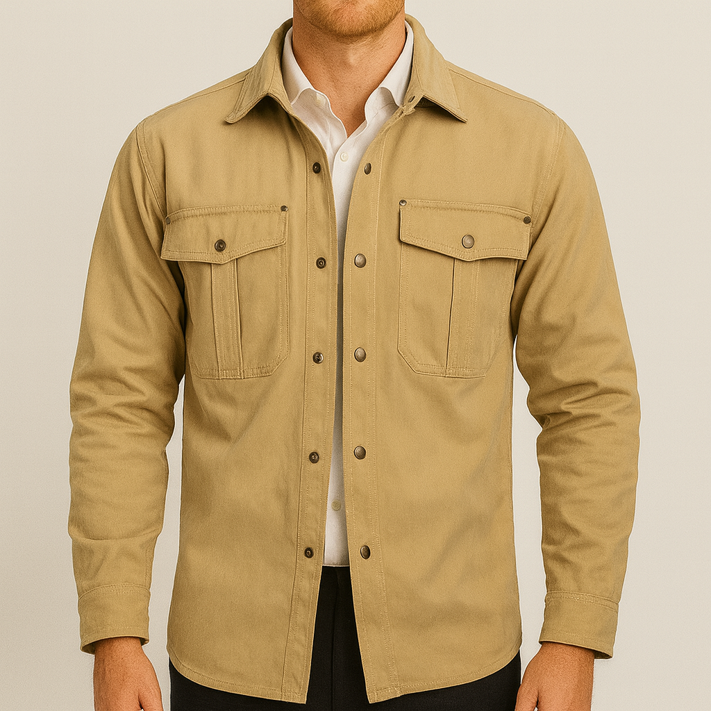 A button-up workwear jacket with flap chest pockets, long sleeves, and a plaid inner lining.