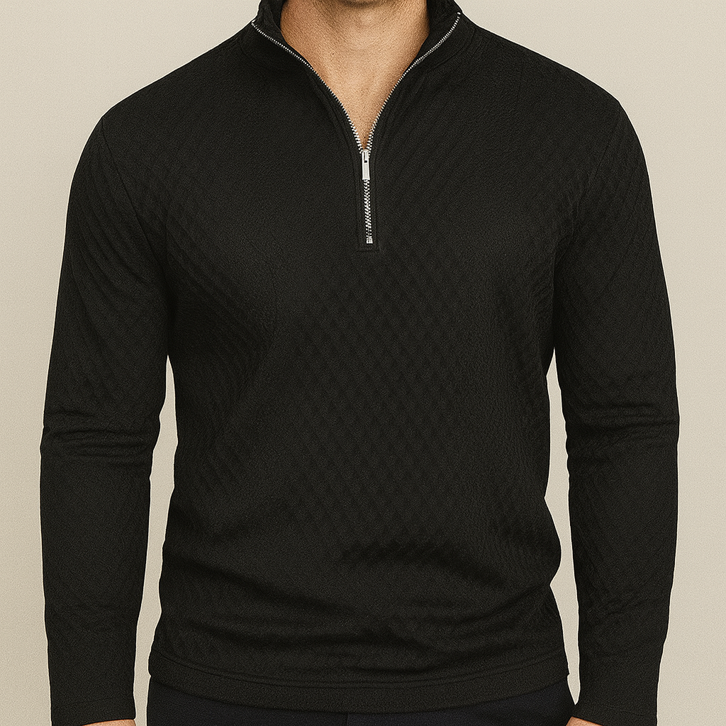 A textured long-sleeve pullover with a half-zip front and mock neck.
