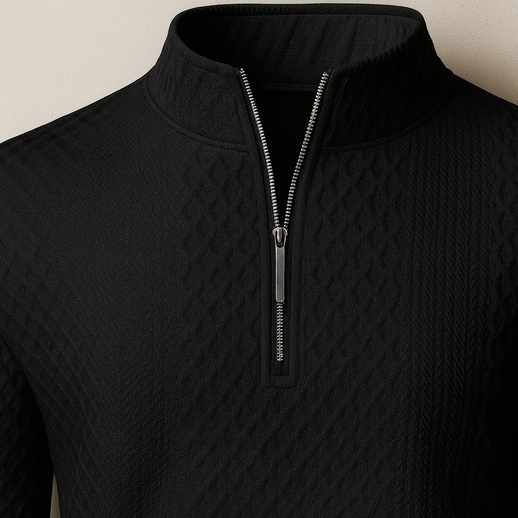 A textured long-sleeve pullover with a half-zip front and mock neck.