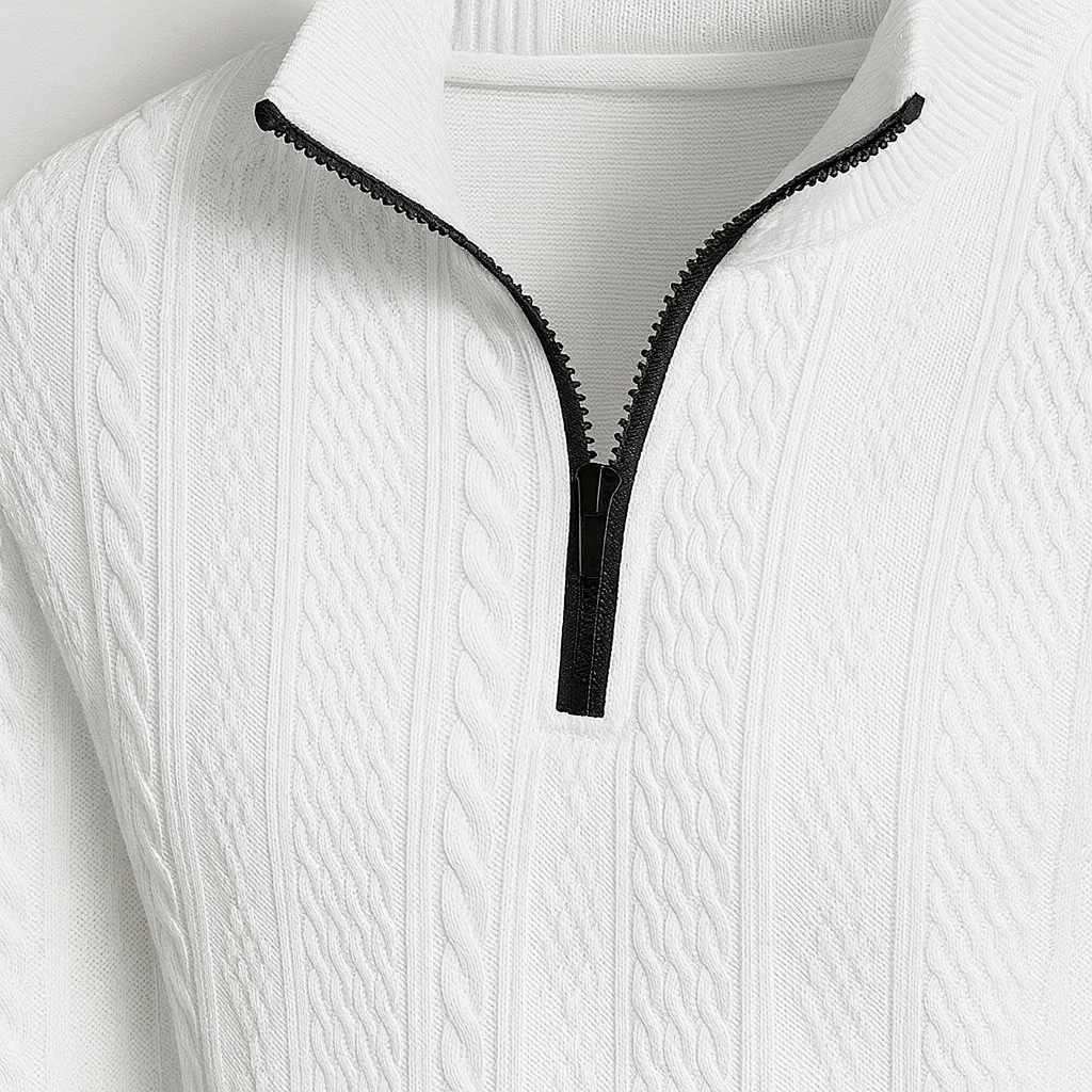 A textured long-sleeve pullover with a half-zip front and stand collar.