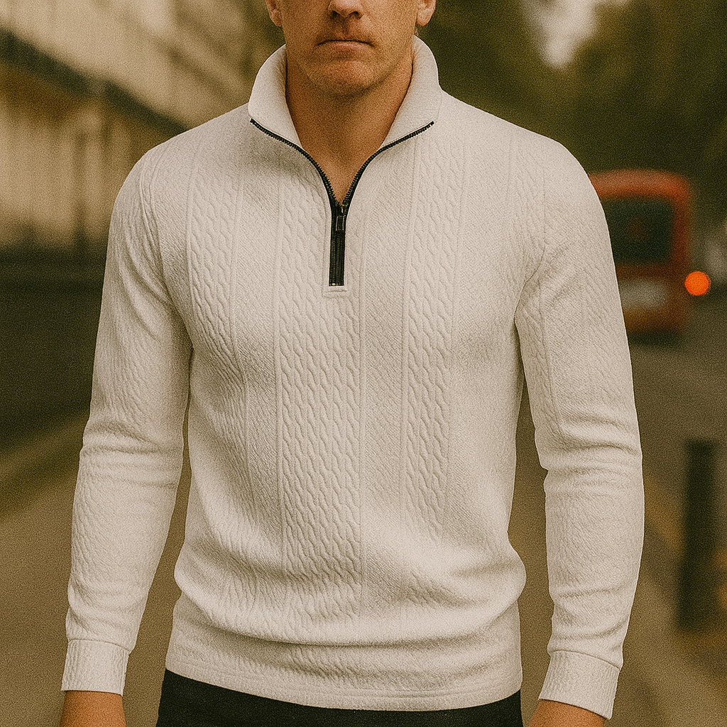 A textured long-sleeve pullover with a half-zip front and stand collar.