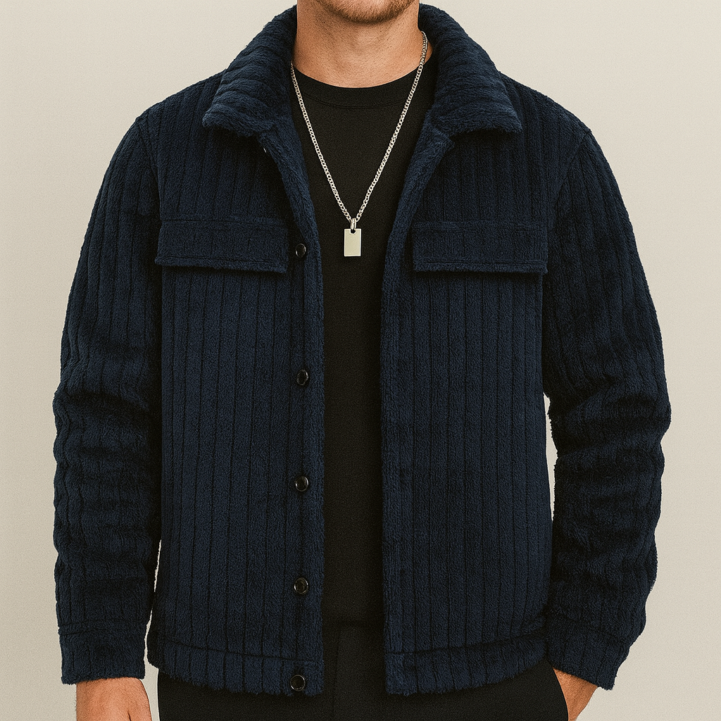 A soft textured button-up jacket with flap chest pockets and a collared design.