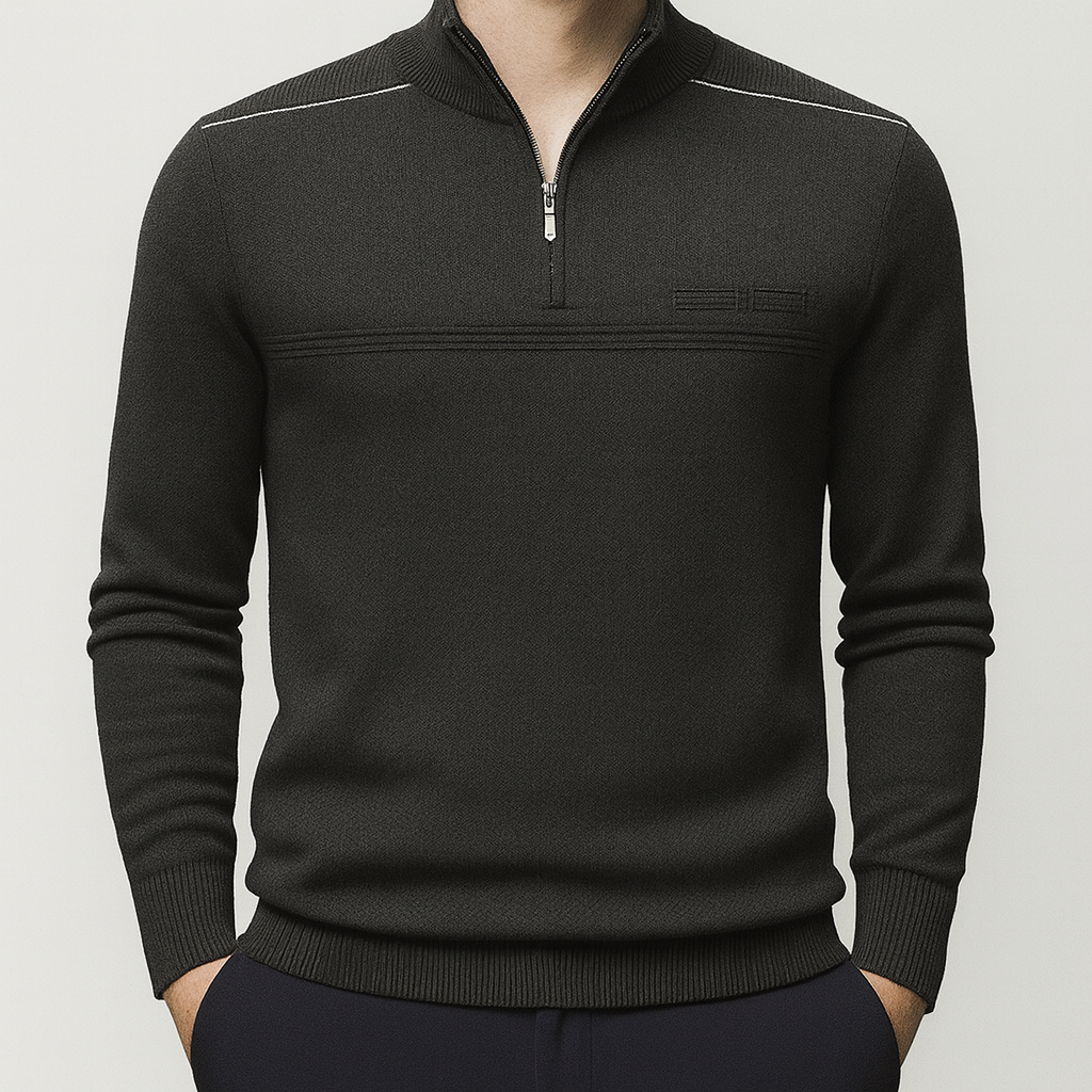 A long-sleeve knit pullover with a half-zip front, ribbed cuffs, and subtle shoulder detailing.